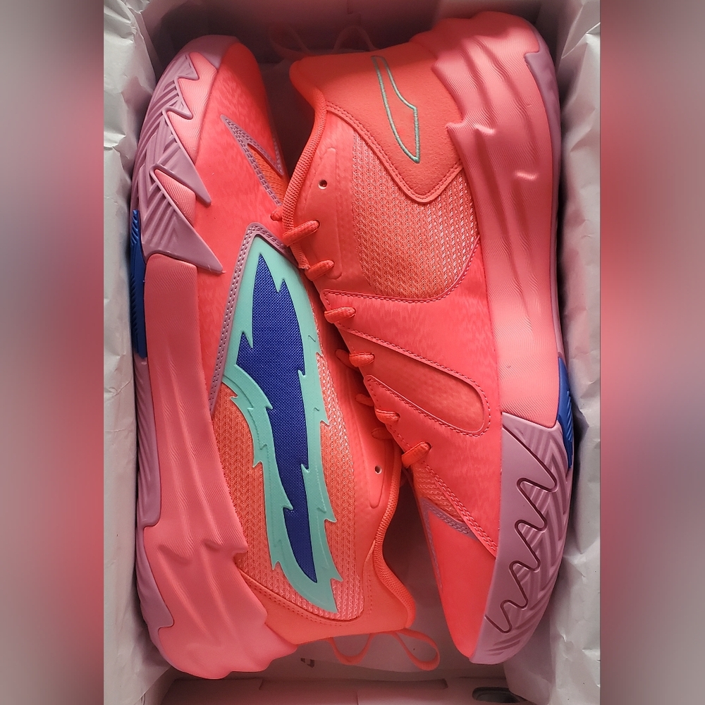 Puma Neon Pink Athletic Shoes with Blue Accents